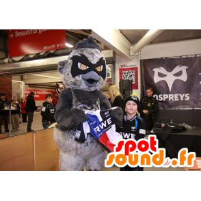 Mascotte d'oiseau gris et noir, géant, aux yeux orange - MASFR22212 - Mascotte d'oiseaux