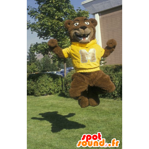 A brown bear mascot with a yellow sweat shirt - MASFR22216 - Bear mascot