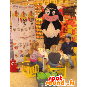 Sort, hvid og lyserød ko-maskot - Spotsound maskot kostume