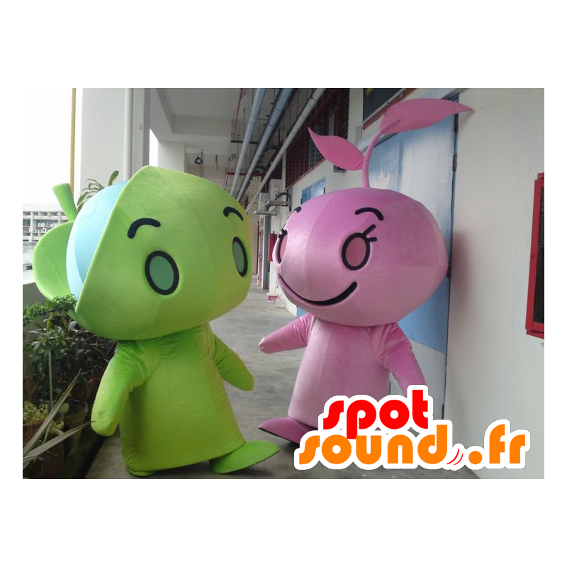 2 maskotar med gröna och rosa figurer, jätte - Spotsound maskot