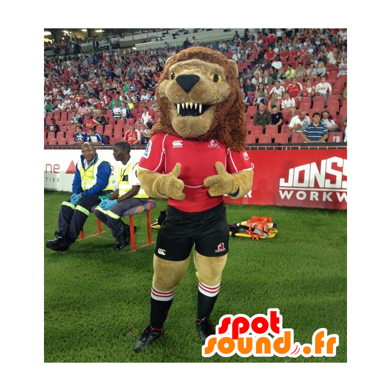 Brown mascotte leone, ruggisce, abito nero e rosso - MASFR22323 - Mascotte Leone Brown mascotte leone, ruggisce, abito nero e rosso - MASFR22323 - Mascotte Leone