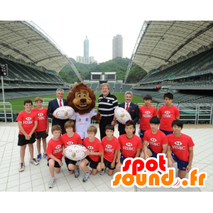 Brown lion mascot, white sportswear - MASFR22335 - Lion mascots
