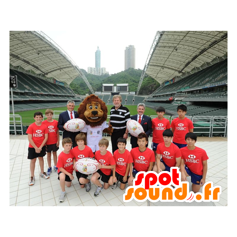 Maskotka lew brązowy, biały sportowej - MASFR22335 - Lion Maskotki Maskotka lew brązowy, biały sportowej - MASFR22335 - Lion Maskotki