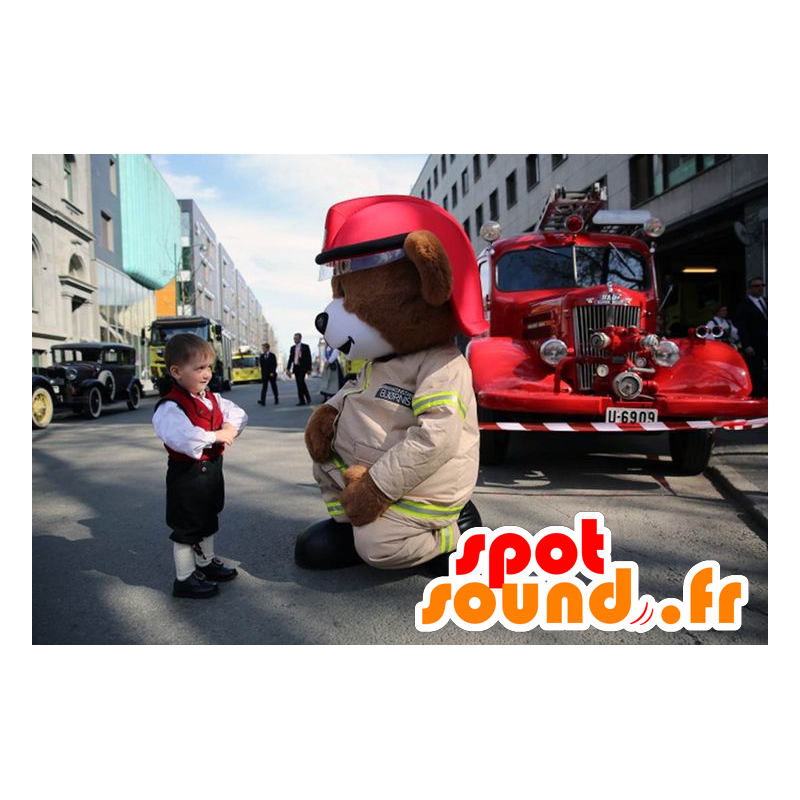 Stor brun bamse maskot i brandmand uniform - Spotsound maskot