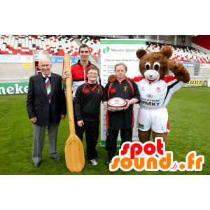 Brun og hvid bamse-maskot med sportsudstyr - Spotsound maskot