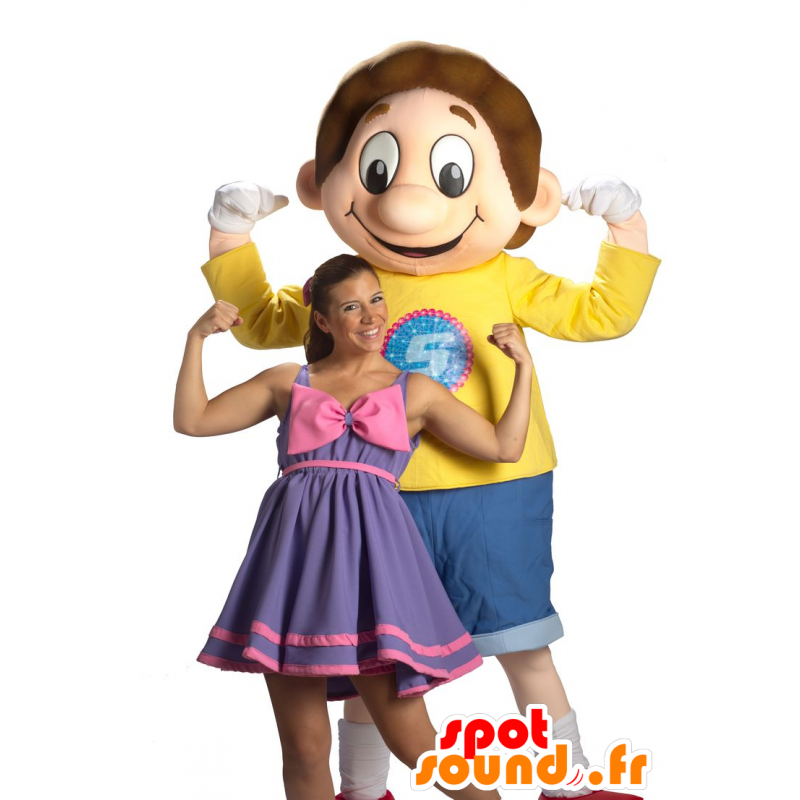 Mascote menino, vestido de azul e amarelo estudante de sorriso - MASFR22499 - mascotes criança