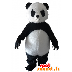 Sort og hvid panda maskot med store kløer