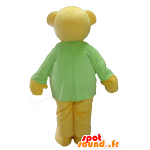 Gul nallebjörnmaskot, med en grön t-shirt - Spotsound maskot