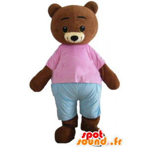 Liten brun björnmaskot, brun, med en rosa och blå outfit -