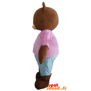 Lille brun bjørnemaskot, brun, med en lyserød og blå tøj -