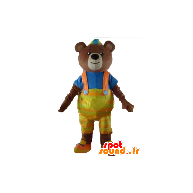 Brun björnmaskot, med gul overaller och en t-shirt - Spotsound