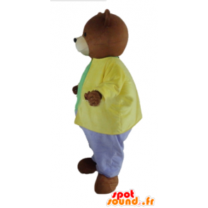 Brunbjörnmaskot klädd i en mycket färgglad outfit - Spotsound