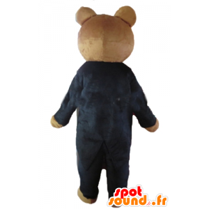 Brun nallebjörnmaskot, klädd i en svart dräkt - Spotsound maskot