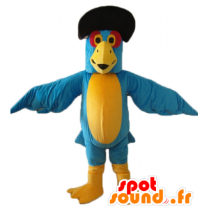 Blå och gul papegojamaskot, med en svart hatt - Spotsound maskot