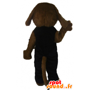 Brun hundmaskot, helt hårig, i svart klädsel - Spotsound maskot