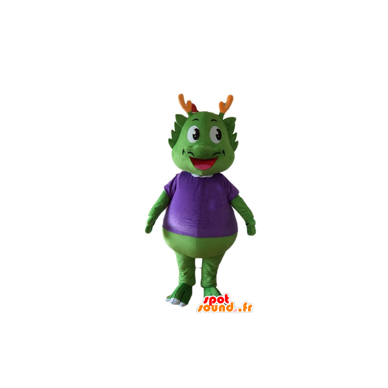 Zielony dinozaur maskotka ubrana w fioletowy, bardzo ciepły - MASFR22883 - dinozaur Mascot
