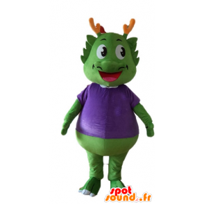 Zielony dinozaur maskotka ubrana w fioletowy, bardzo ciepły - MASFR22883 - dinozaur Mascot