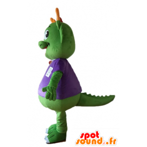 Zielony dinozaur maskotka ubrana w fioletowy, bardzo ciepły - MASFR22883 - dinozaur Mascot