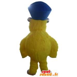 Mascote monstro amarelo, todo peludo, com um chapéu - MASFR23106 - mascotes monstros
