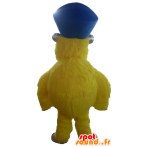 Giallo mostro mascotte, tutto peloso, con un cappello - MASFR23106 - Mascotte di mostri