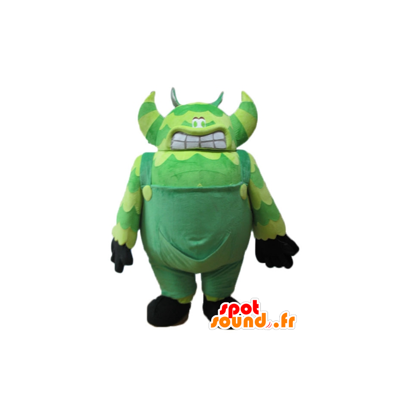 Green monster mascot, in overalls, very big and funny - MASFR23250 - Monsters mascots