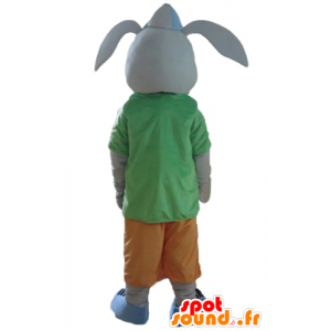 Grå kaninmaskot, leende, med en färgglad outfit - Spotsound