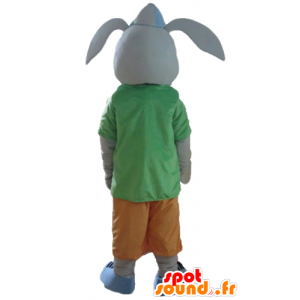 Mascote coelho cinza, sorrindo, com uma roupa colorida - MASFR23308 - coelhos mascote