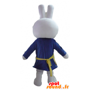 White rabbit mascot, dressed in blue, with an apron - MASFR23460 - Rabbit mascot