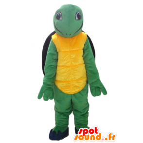 Mascotte gialla tartaruga verde e nero, cordiale e sorridente - MASFR24135 - Tartaruga mascotte