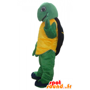 Mascotte gialla tartaruga verde e nero, cordiale e sorridente - MASFR24135 - Tartaruga mascotte