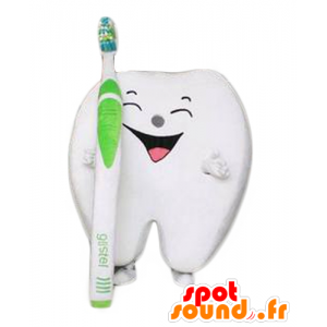 Branco da mascote do dente rindo, um gigante com uma escova de dentes - MASFR24281 - Mascotes não classificados