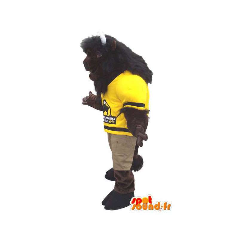 Brun buffelmaskot i gul tröja - Spotsound maskot