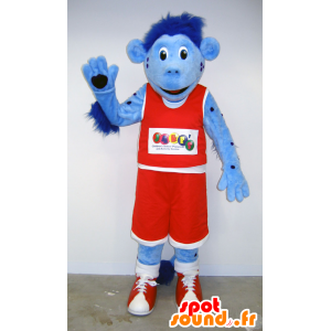 Blå ape maskot i rødt holding basketball