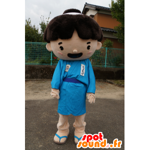 Japansk dreng maskot iført en blå tunika - Spotsound maskot
