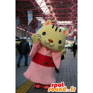 Mascotte de chat jaune, habillé d'une tunique rose - MASFR25221 - Mascottes Yuru-Chara Japonaises