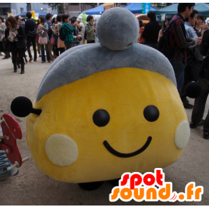 Chobin-kun maskot, gul och grå man, leende bi - Spotsound maskot