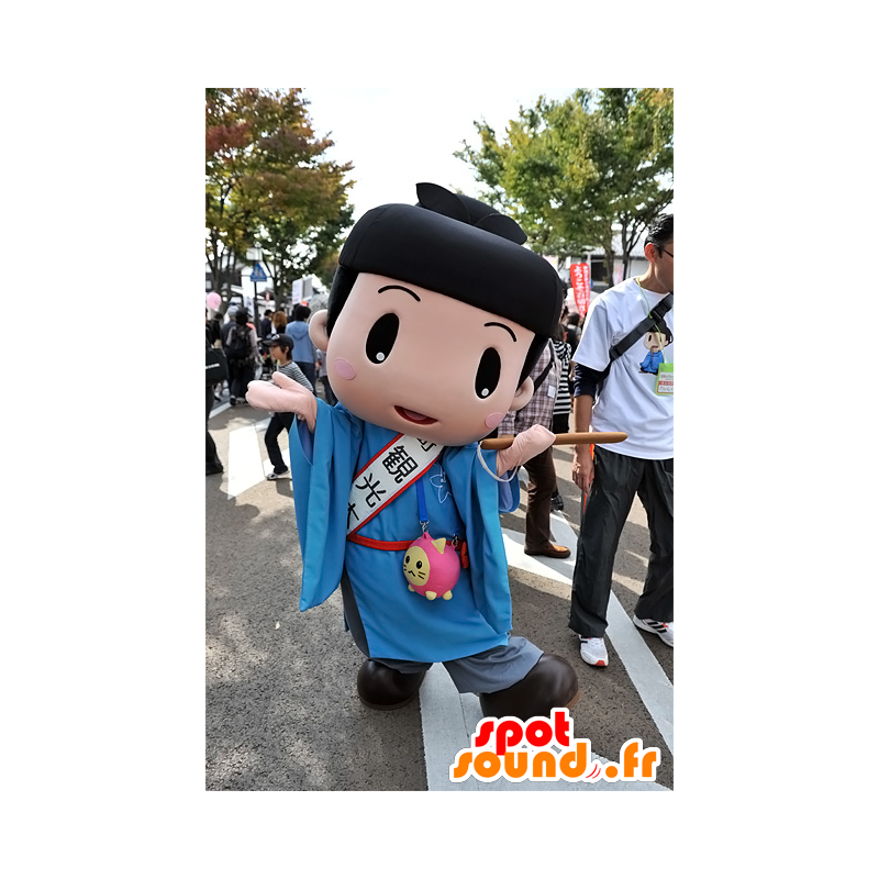 Japansk drengemaskot iført en blå tunika - Spotsound maskot