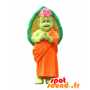 Shakame-kun maskot, grøn munk, i traditionel orange kjole -