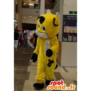 Mascot yellow and black animal, all hairy with horns - MASFR25455 - Yuru-Chara Japanese mascots