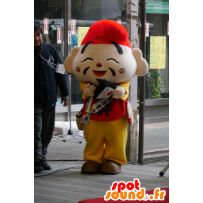 Asiatisk maskot, japansk klädd röd och gul hund - Spotsound