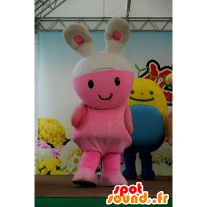 Pink og hvid kanin maskot, sød og smilende - Spotsound maskot