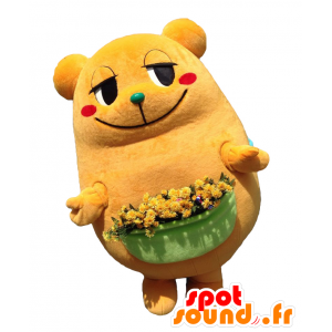 Mikarun maskot, orange nallebjörn med en blomkruka - Spotsound