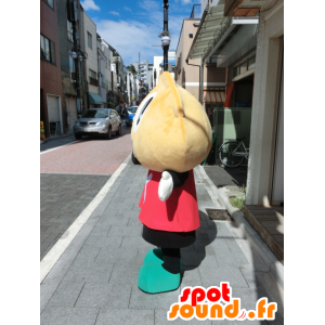 Kentakun maskot, beige dumpling i röd och svart outfit -
