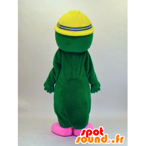 Wakkun maskot, grøn og lyserød platypus med hovedtelefoner -