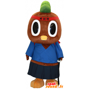 Tachi-kun maskot, brun och grön fågel i samurai-outfit -