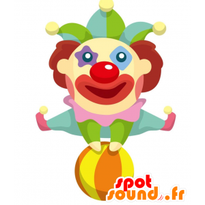 Glad och mångfärgad clownmaskot. Cirkus maskot - Spotsound
