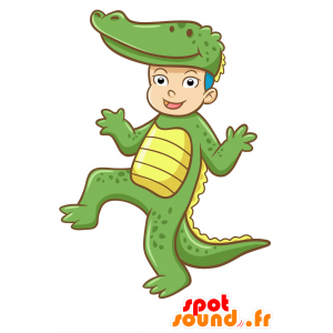 Barnmaskot förklädd till en grön och gul krokodil - Spotsound