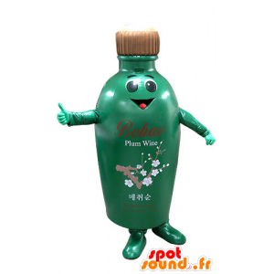 Grön och brun flaskmaskot som ler - Spotsound maskot