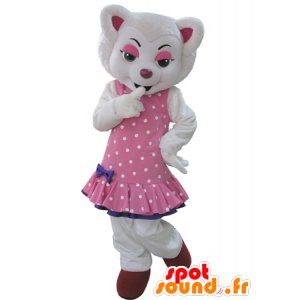 Hvid ulvmaskot, klædt i en lyserød kjole med prikker -