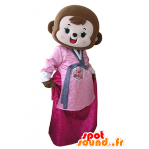 Brun abe maskot klædt i lyserød kjole - Spotsound maskot kostume